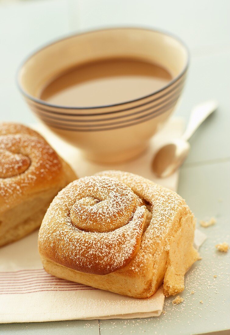 Ensaimades (coiled pastries, Mallorca) with milky coffee