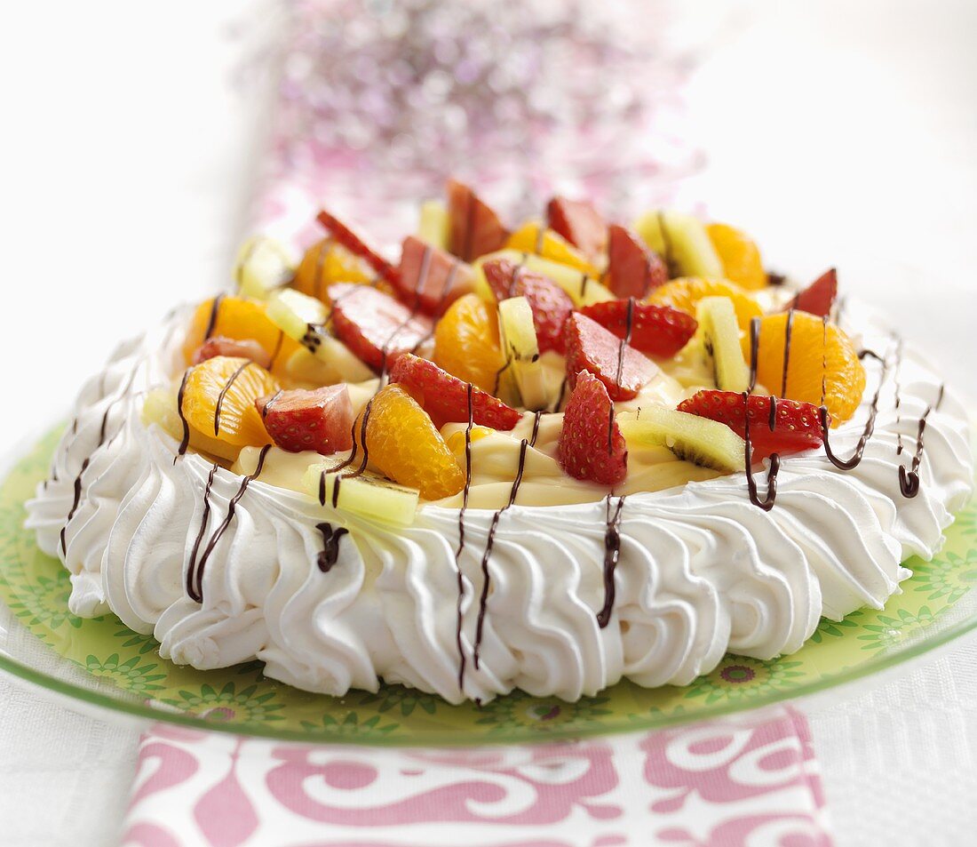 Pavlova (meringue cake, Australia) with fruit and berries