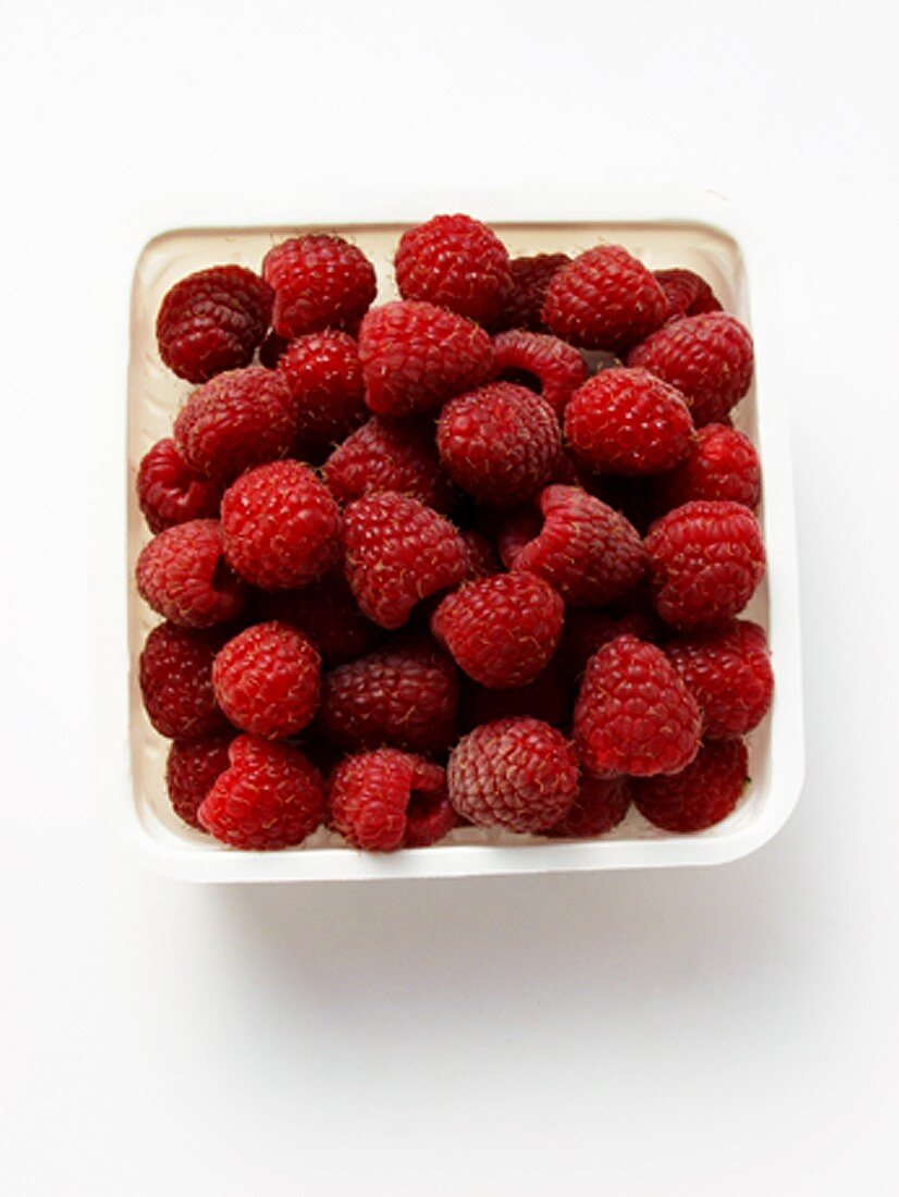 Raspberries in a Plastic Container