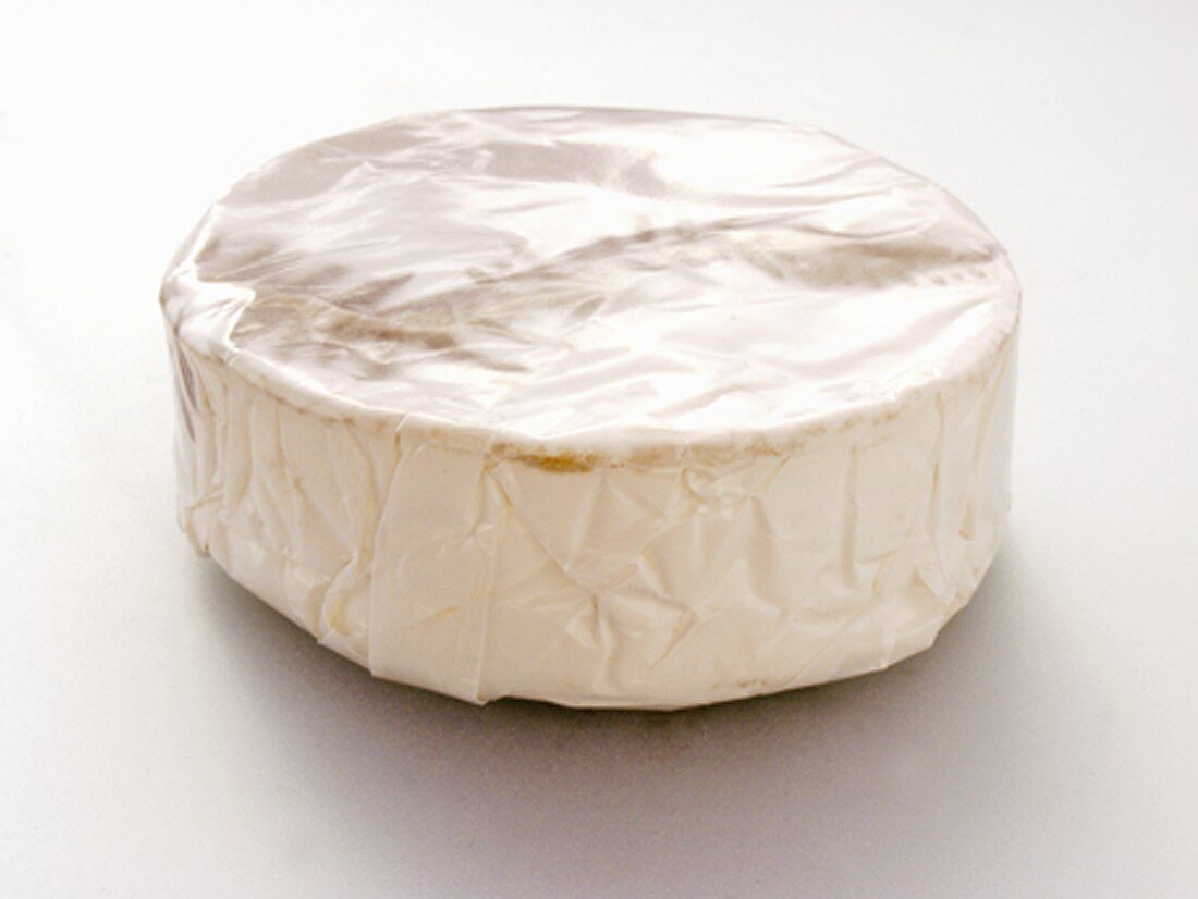 Camembert in Paper Wrapping
