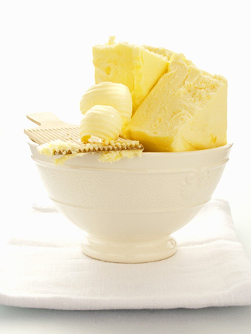 Butter with Butter Curls in a White Bowl
