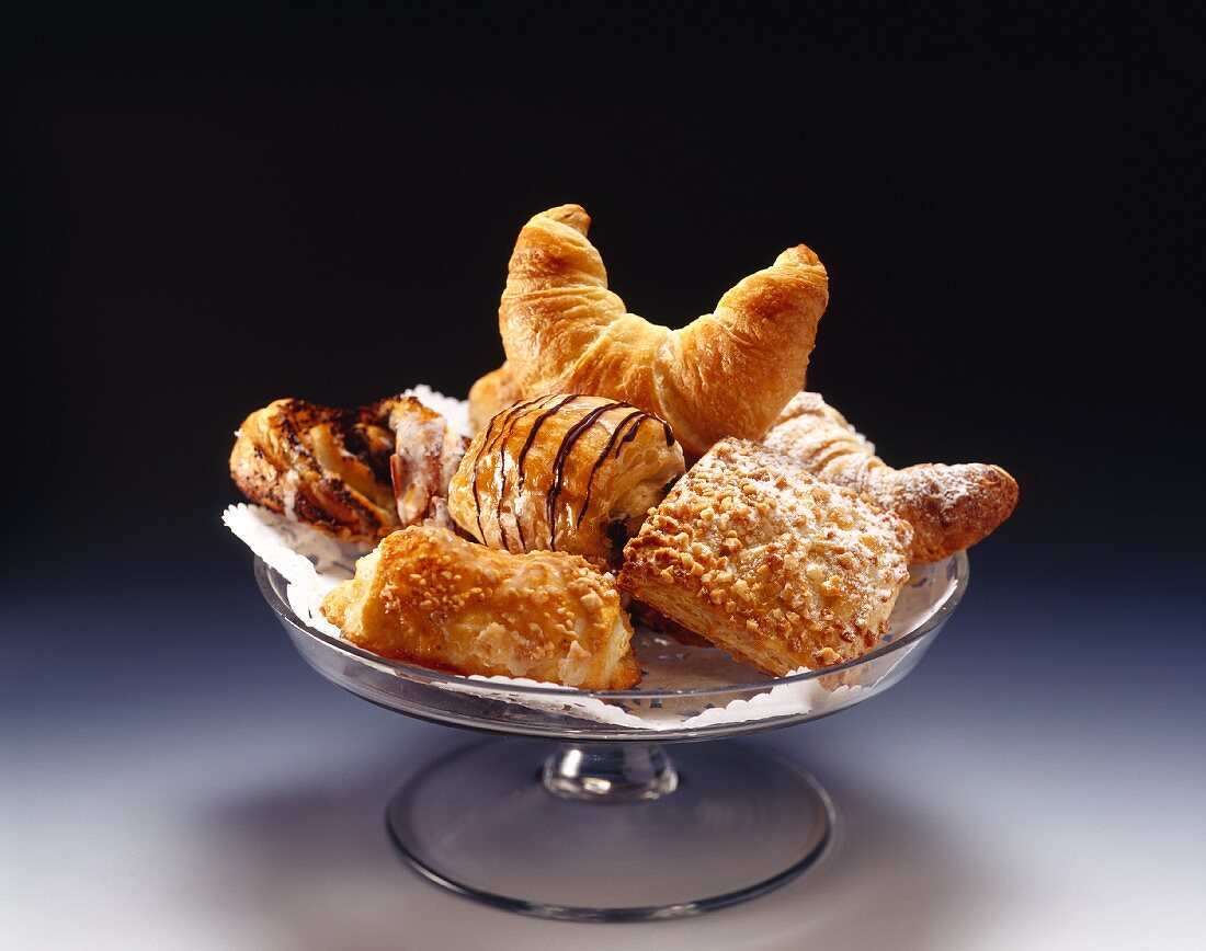 Assorted sweet pastries on cake stand