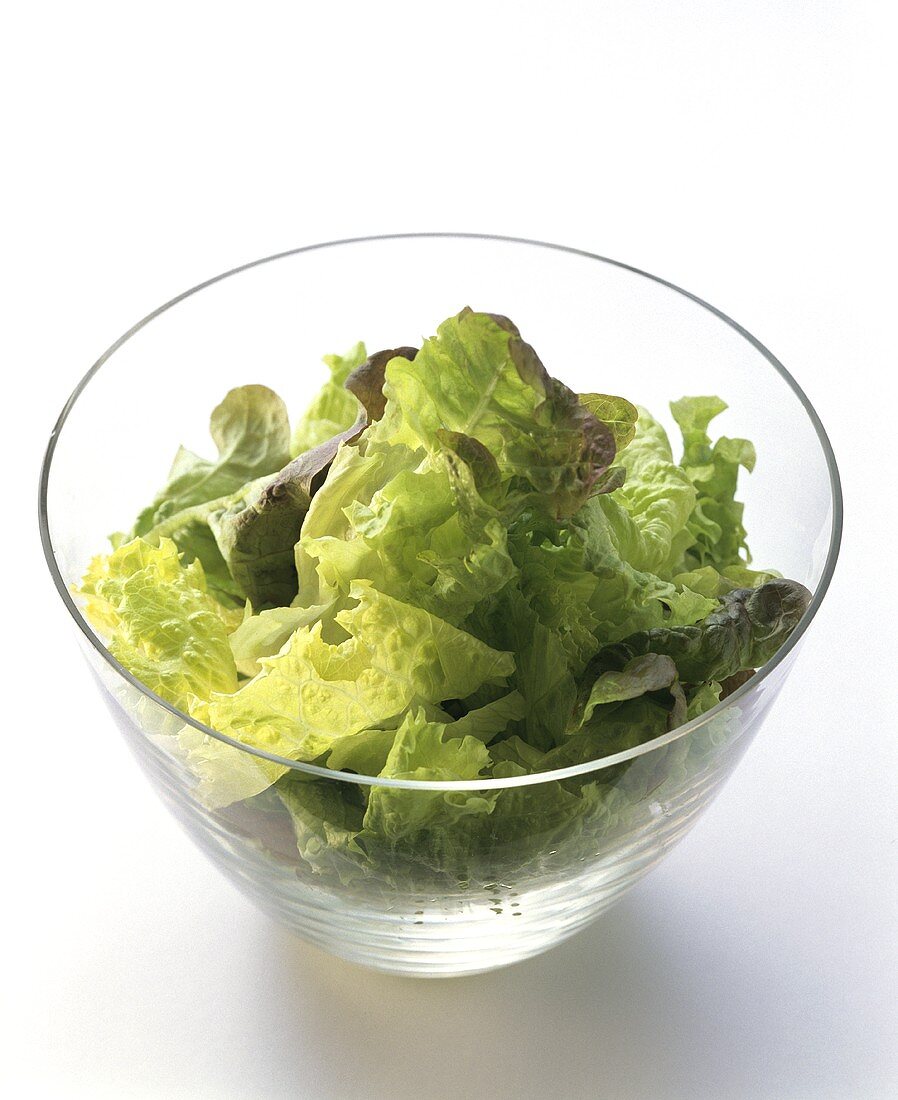 Mixed Lettuce in a Glass Salad Bowl