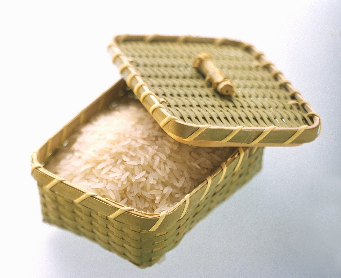 Uncooked Rice in a Covered Basket