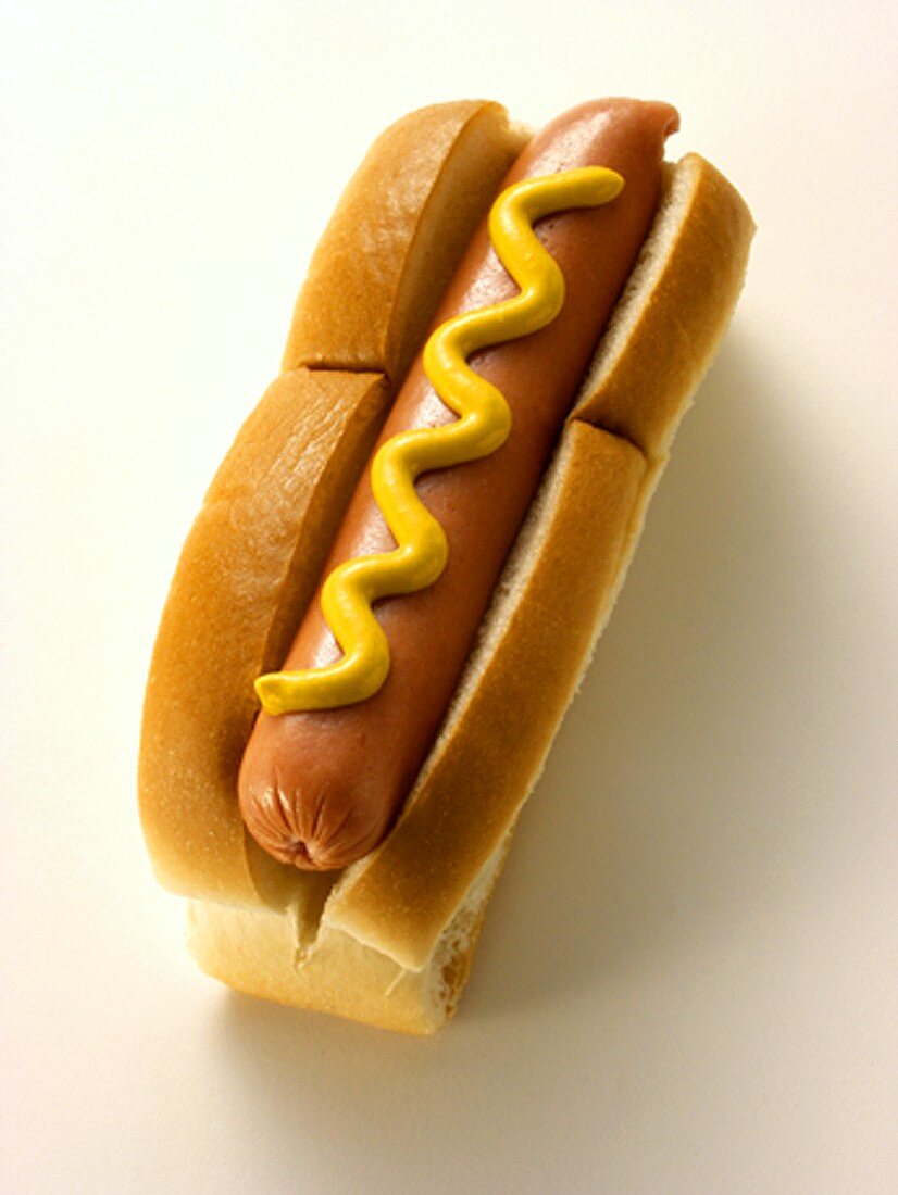 A Hot Dog in a Bun with Mustard
