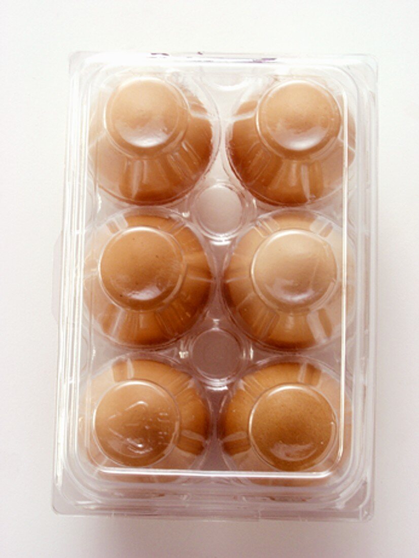 Brown Eggs in a Clear Carton