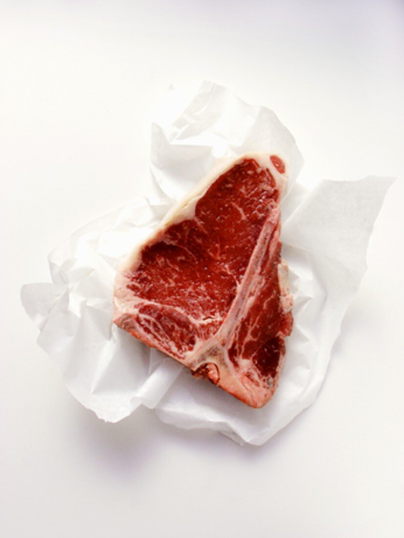 A T-Bone Steak on Butcher's Paper