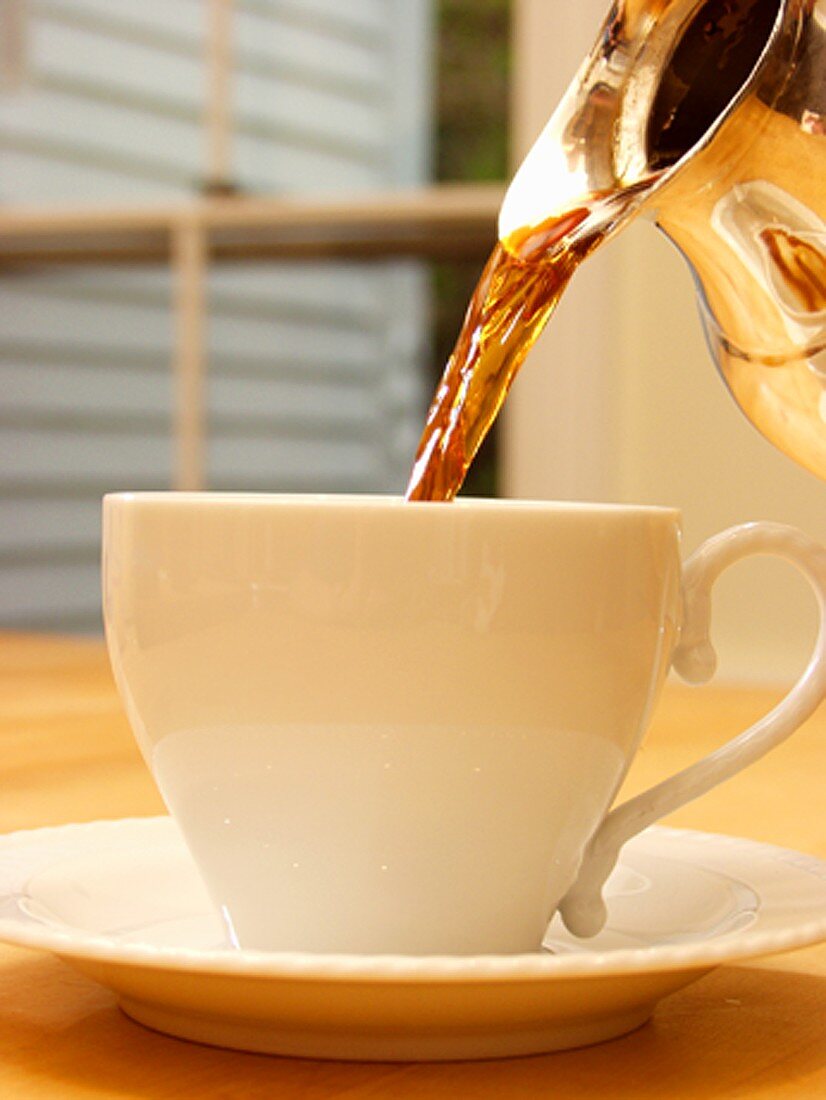 Pouring Coffee into a Cup