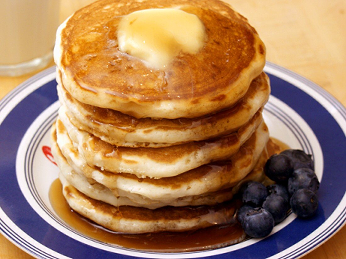 A Stack of Pancakes with Maple Syrup