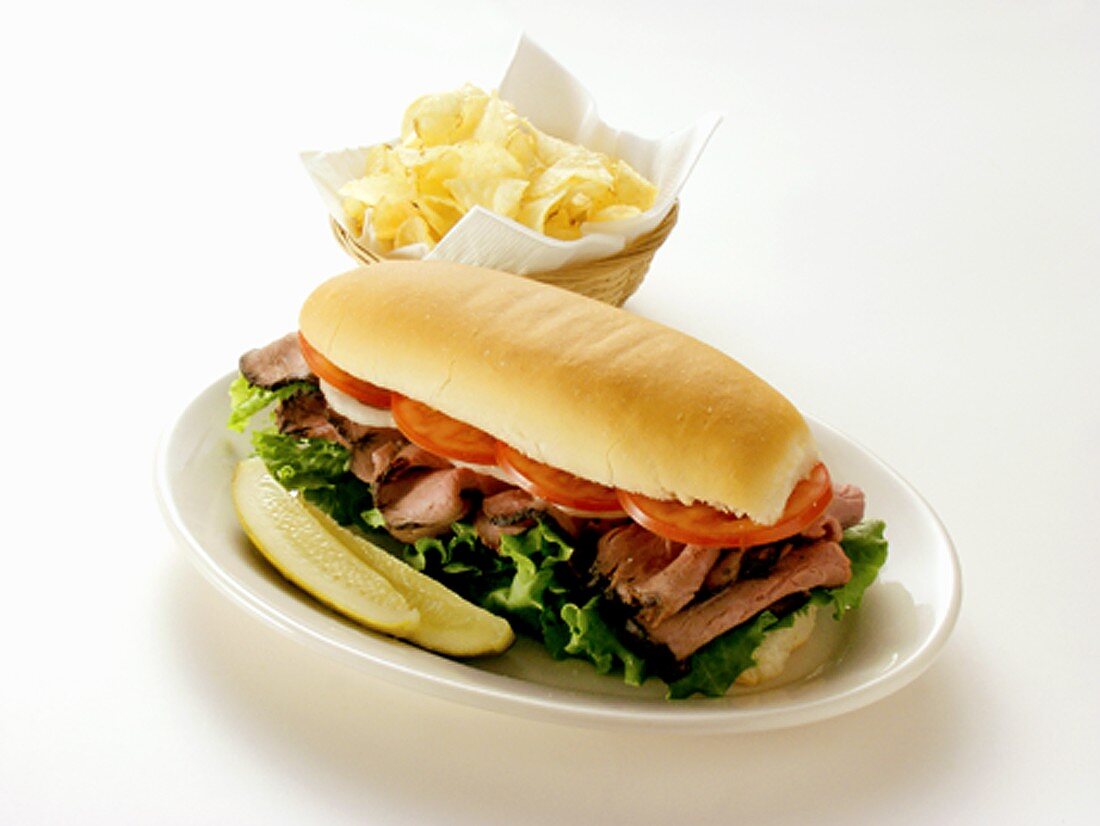 A Roast Beef Sub with Chips