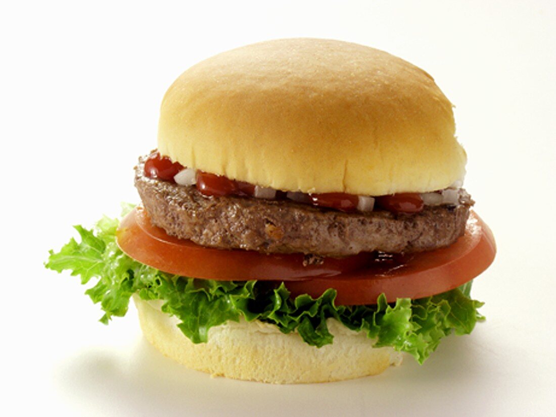 Hamburger mit Salat, Tomaten und Ketchup