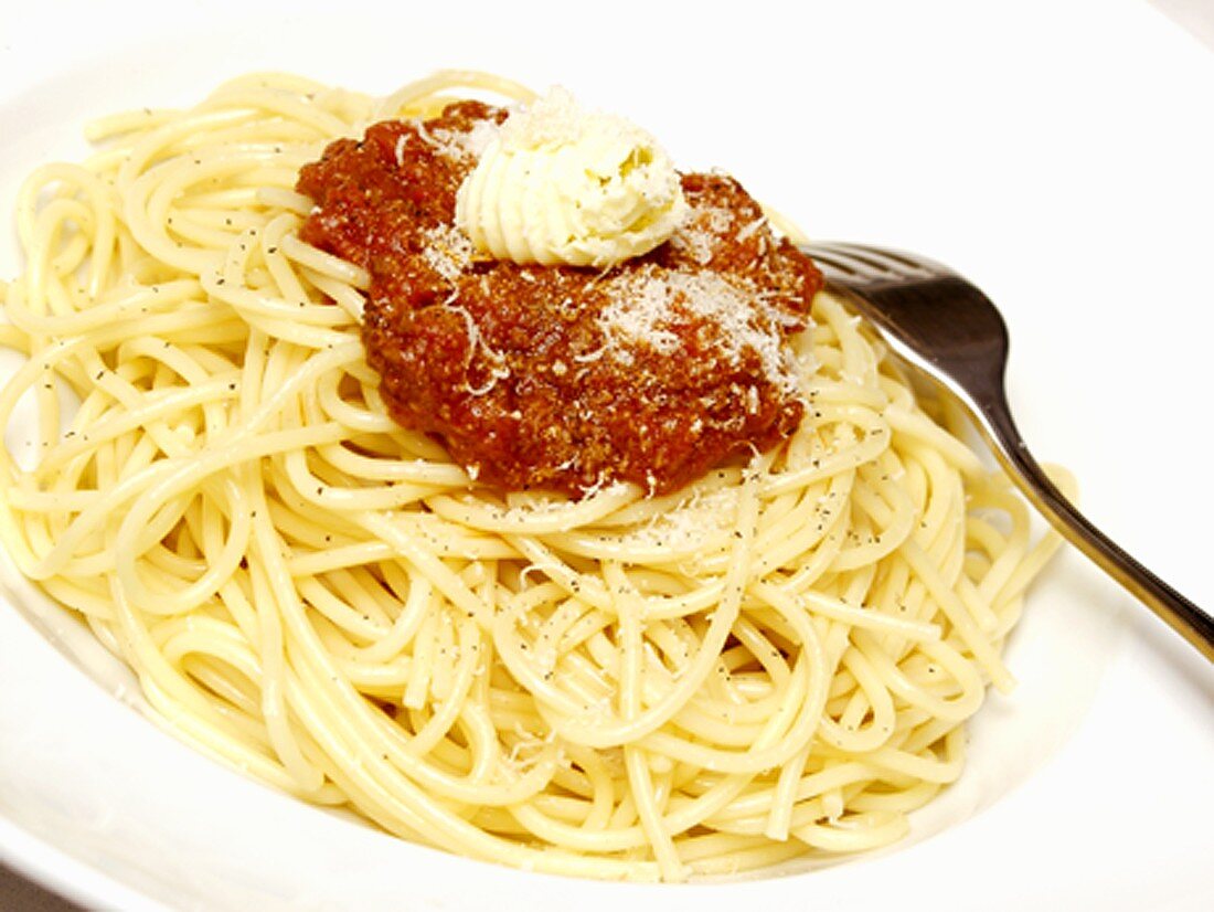 Spaghetti with Meat Sauce Topped with Butter