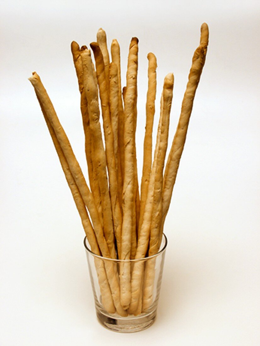 A Glass with Bread Sticks