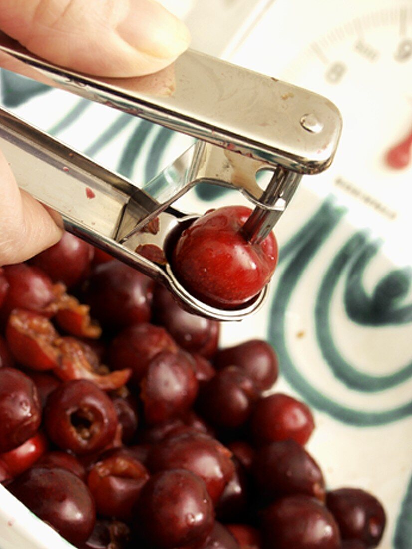 Cherries Being Pitted