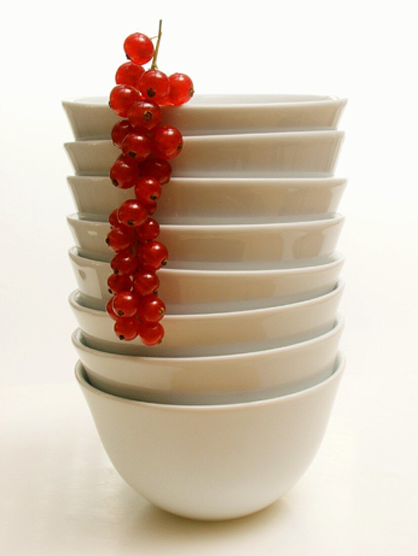 Stacked White Bowls with Red Currants