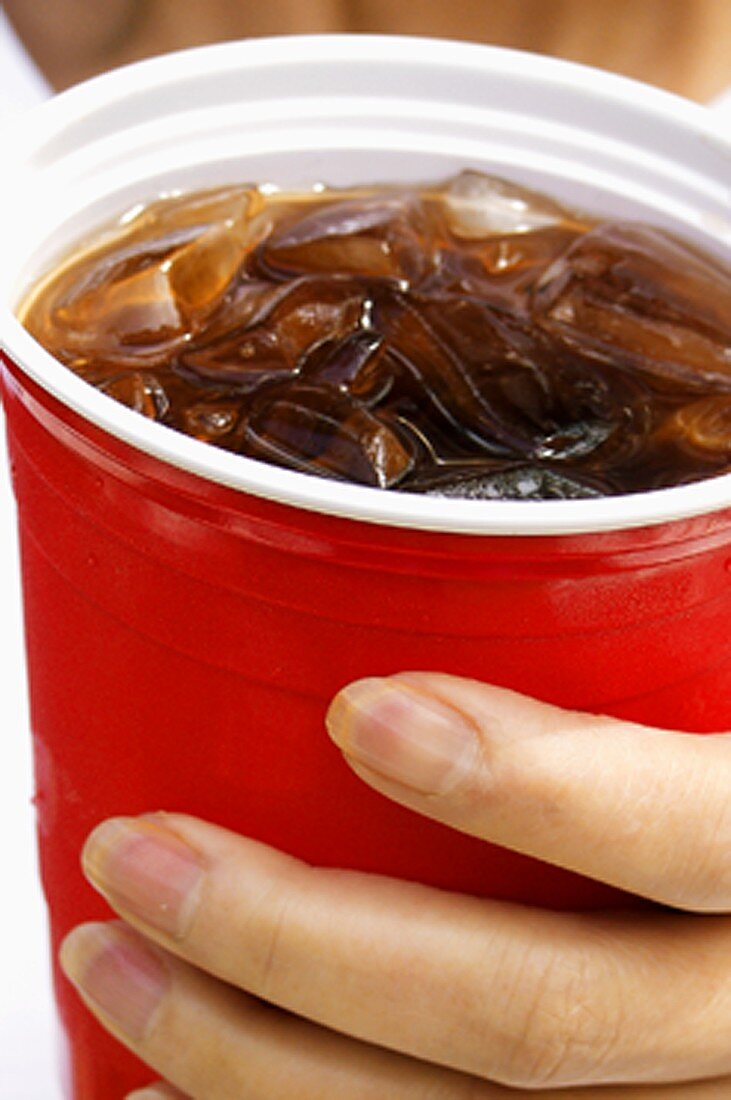 Holding a Cup of Cola