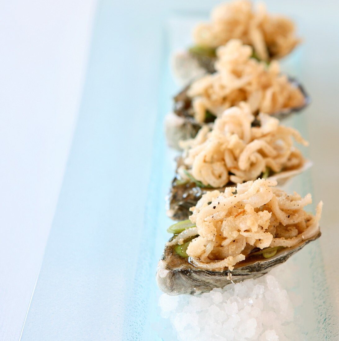 Oysters with grated, deep-fried onions