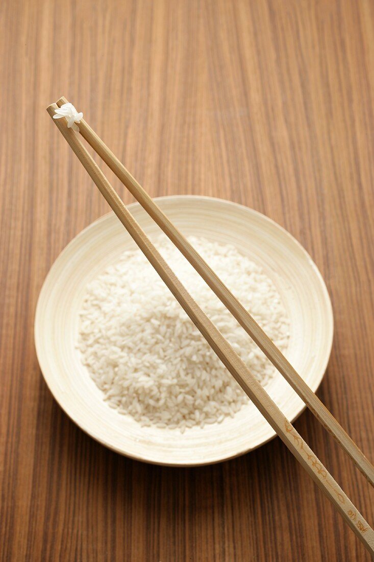 Dish of rice with chopsticks