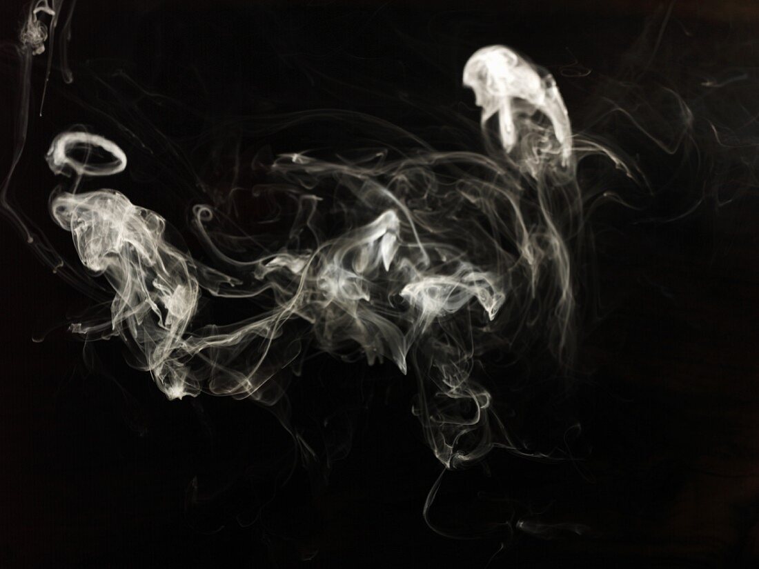 Smoke against a black background