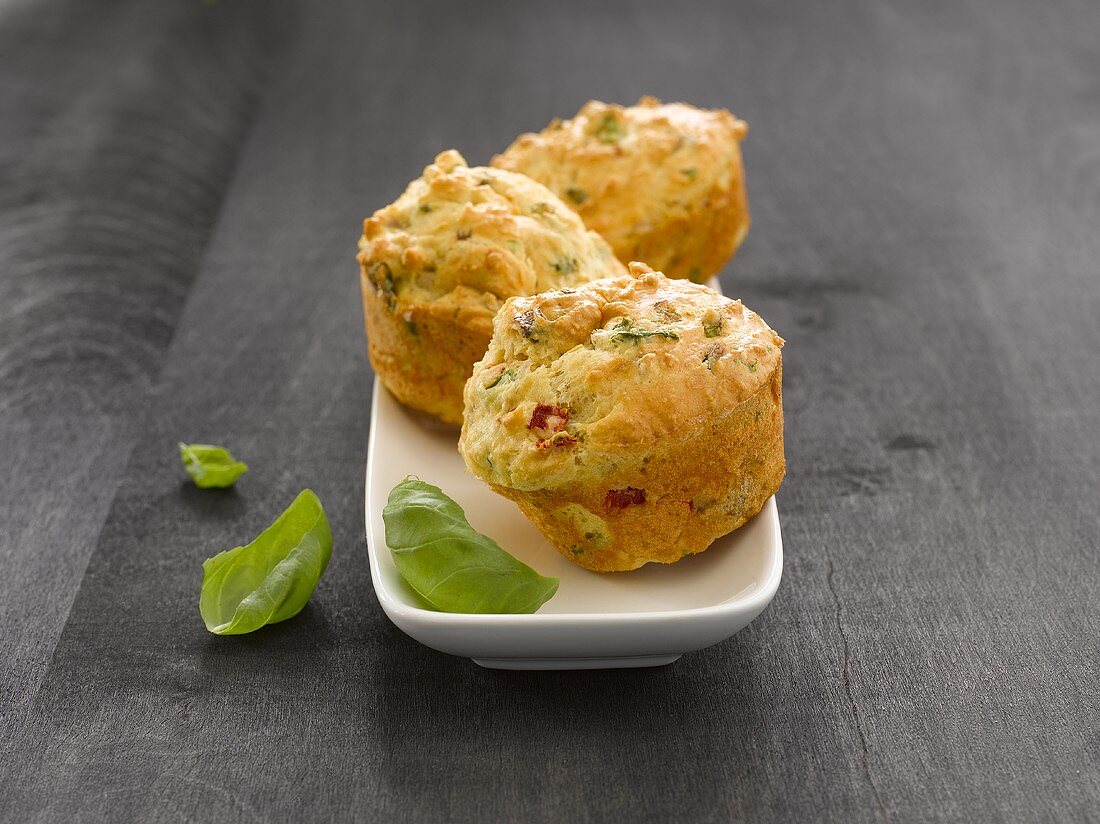Three vegetable muffins with basil