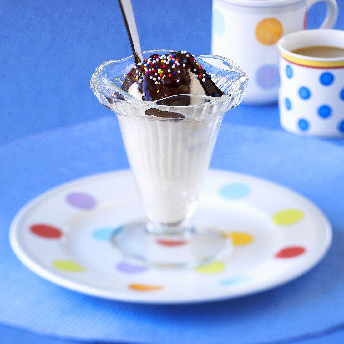 Ice cream sundae with chocolate sauce and sprinkles