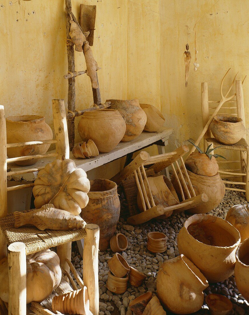 Chairs and old terracotta pots