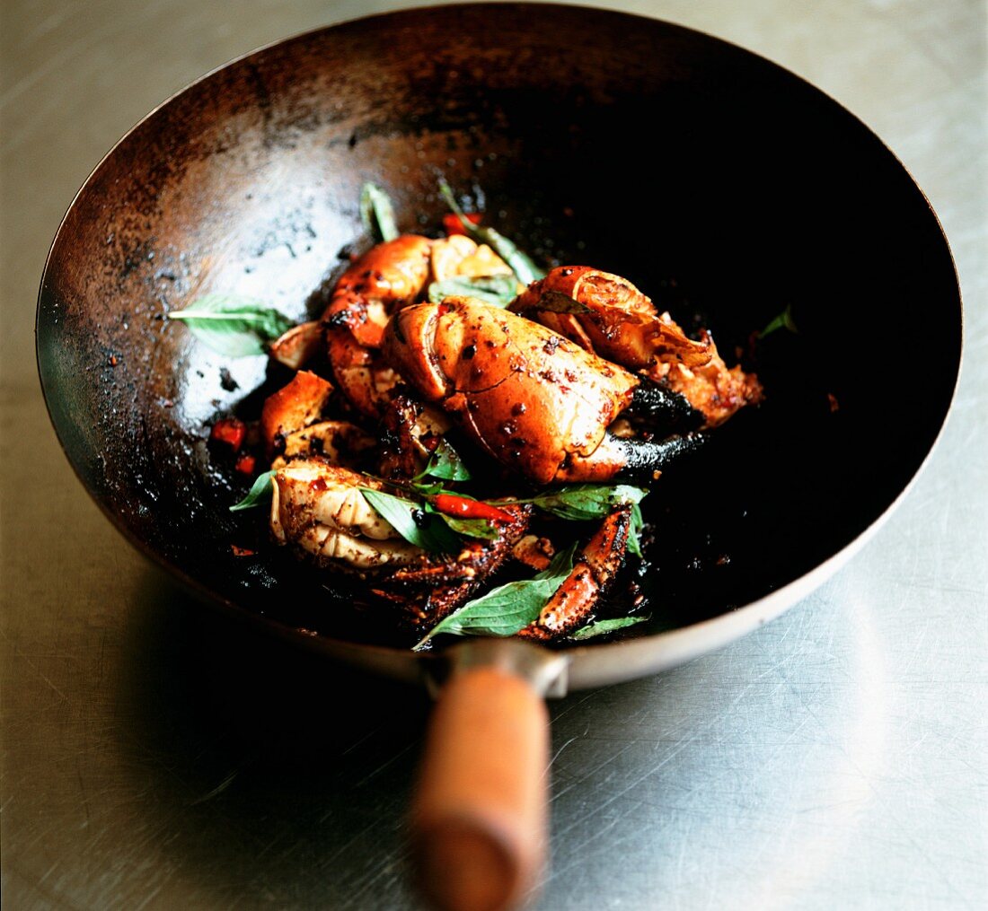 Fried crab claws with chilli and sweet basil