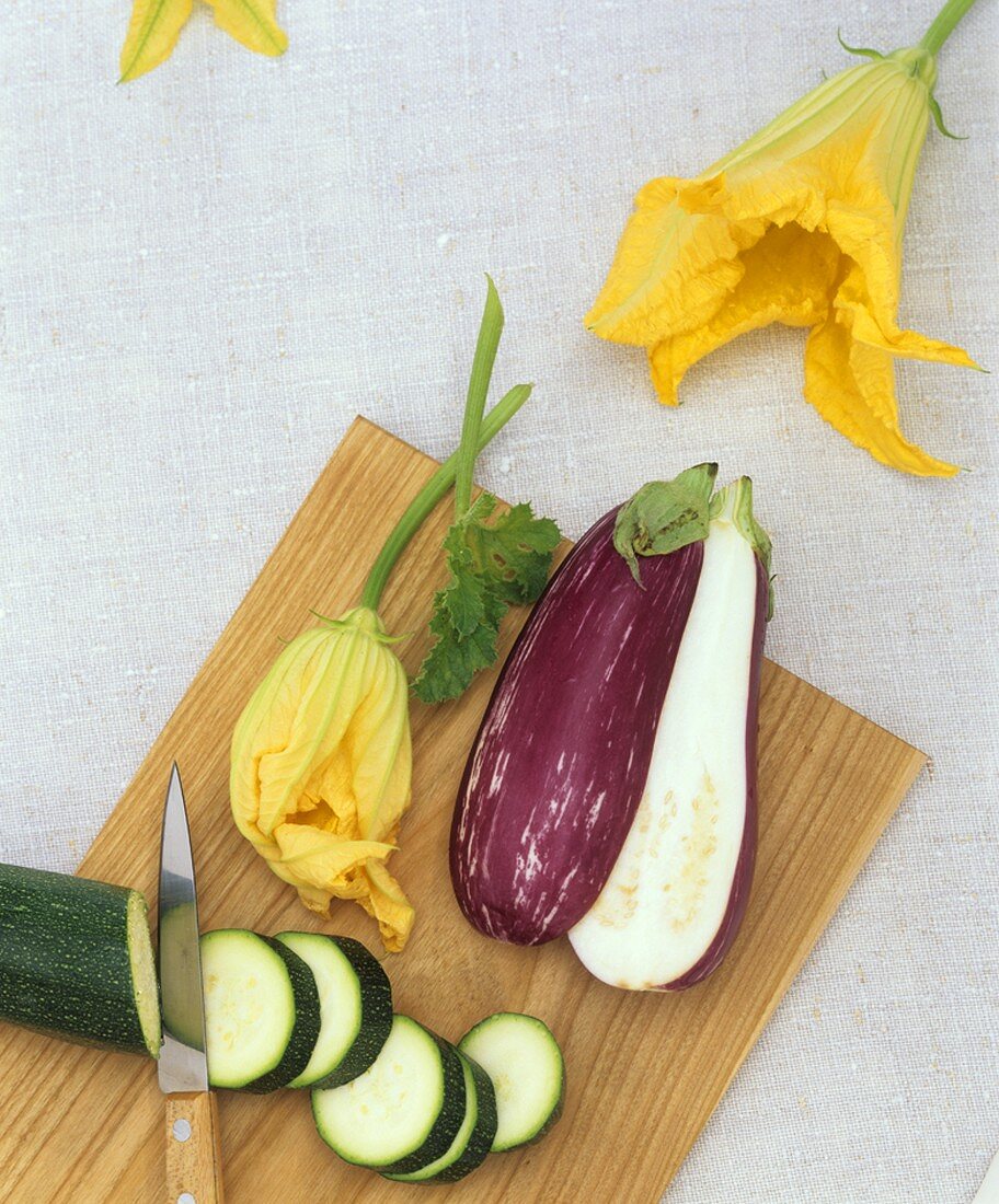 Courgette, courgette flowers and an aubergine