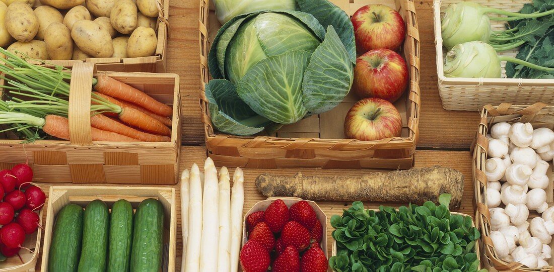 Various vegetables and fruit in baskets