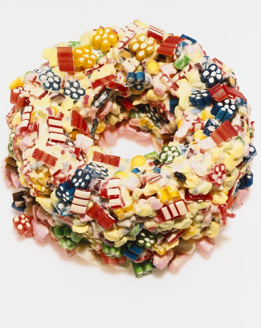 Ring cake covered in sweets