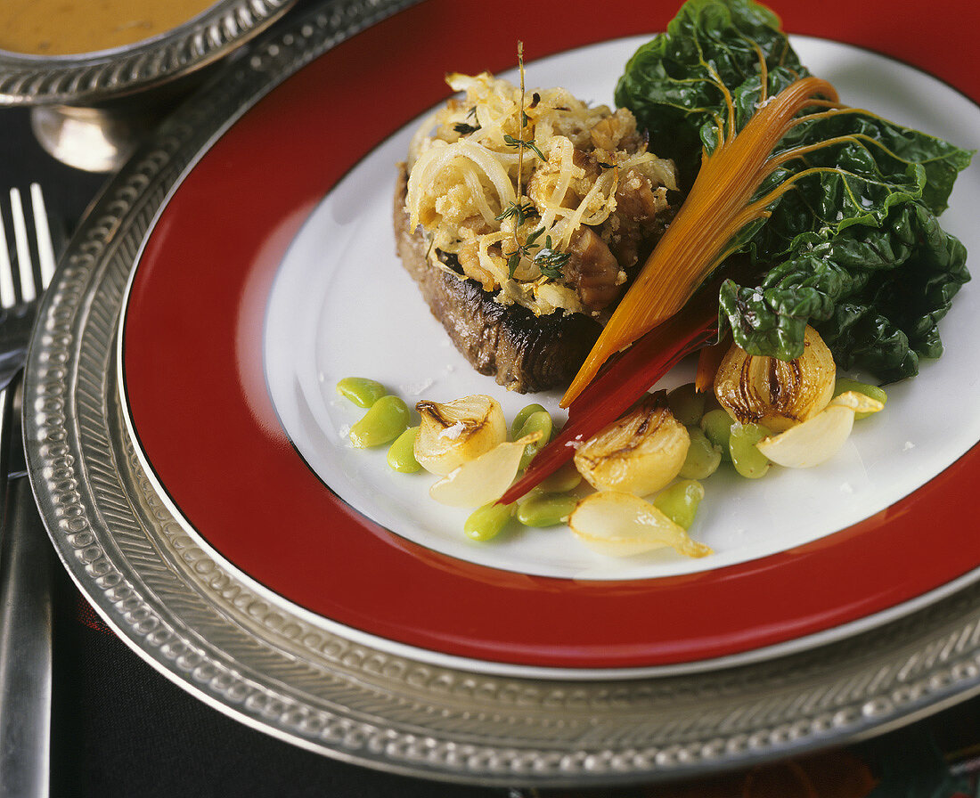 Filet mignon with chestnut and onion crust and chard