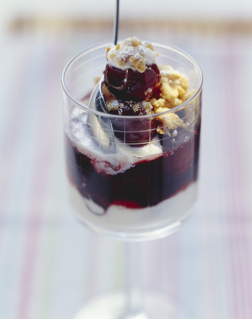 Cherry compote with crumble and cream