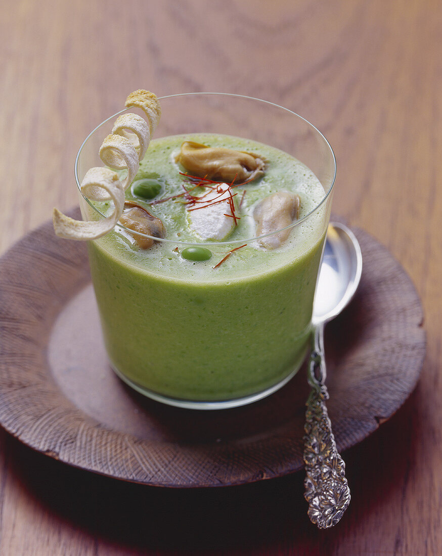 Pea cream soup with mussels