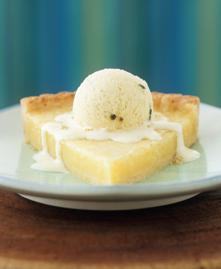 A piece of lemon tart with ice cream