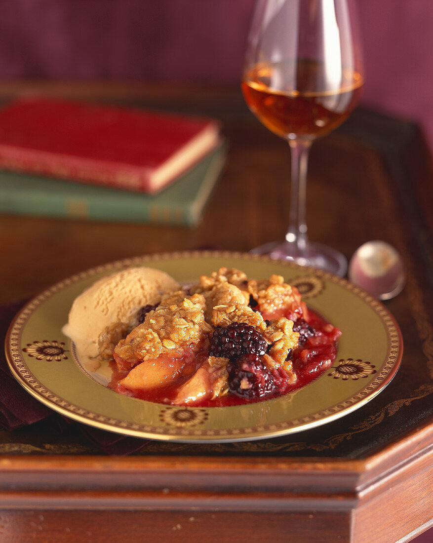 Apple and blackberry crumble with vanilla ice cream