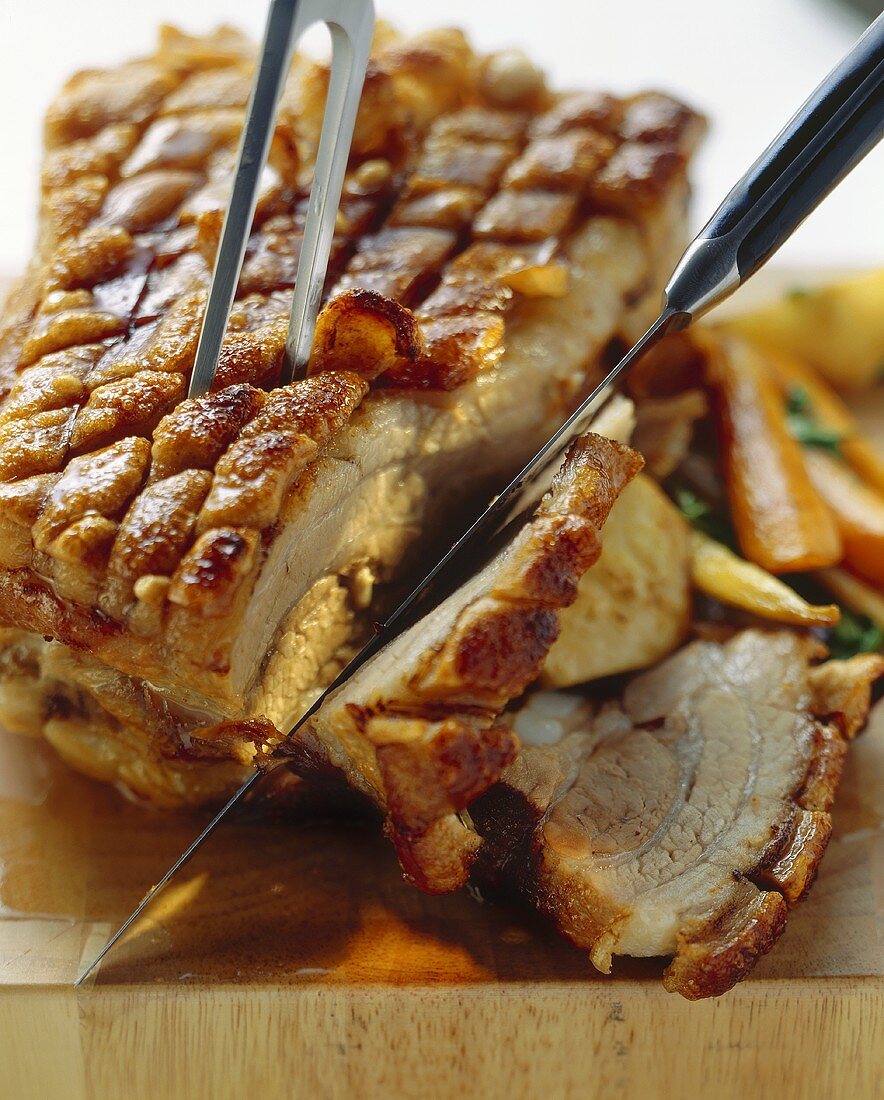 Roast pork with crackling and vegetables
