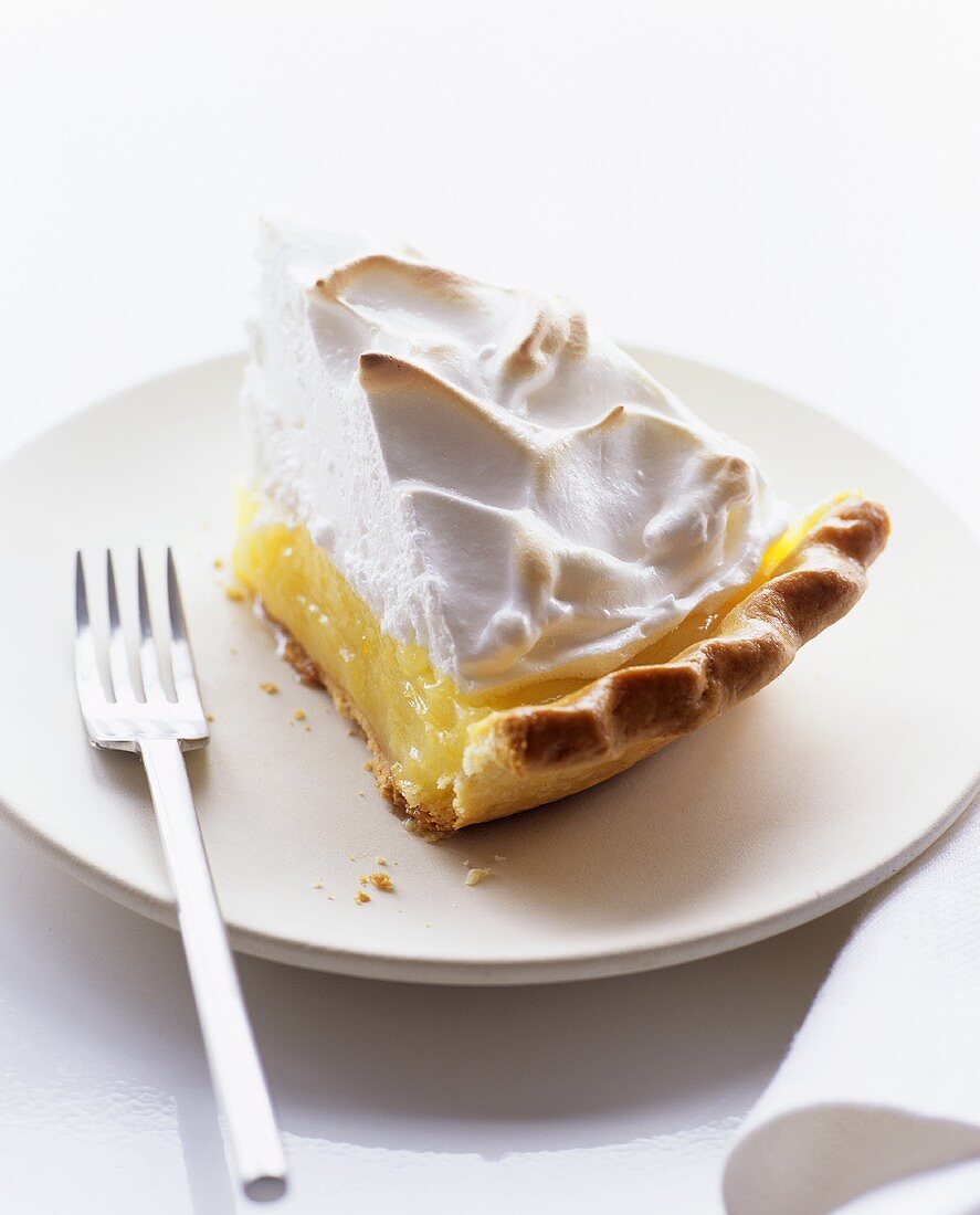 A piece of lemon meringue tart