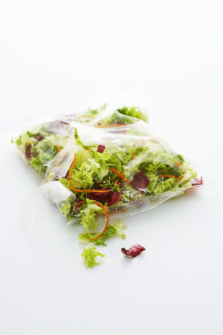 Mixed salad leaves in a plastic bag