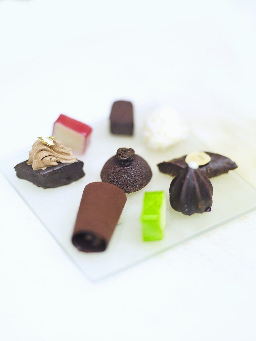 Assorted chocolates on a piece of glass