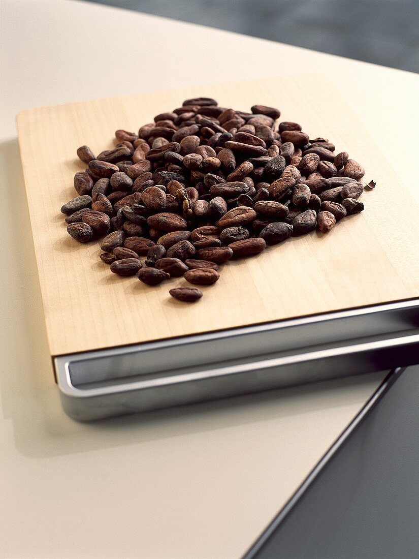 Cocoa beans on a wooden board