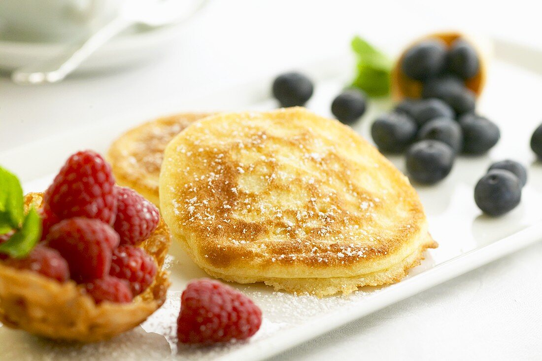 Small pancakes with fresh berries