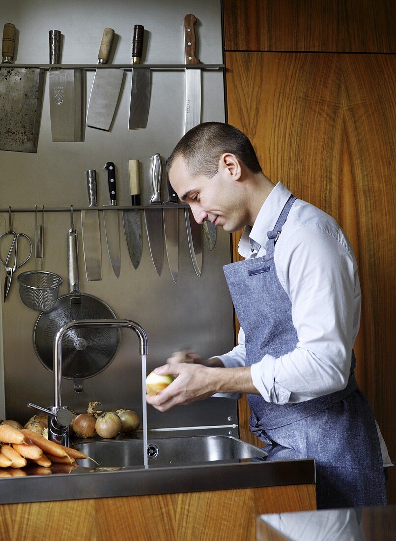 Man peeling onions