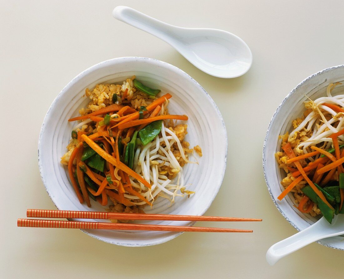 Fried rice with carrots, mangetout, bean sprouts