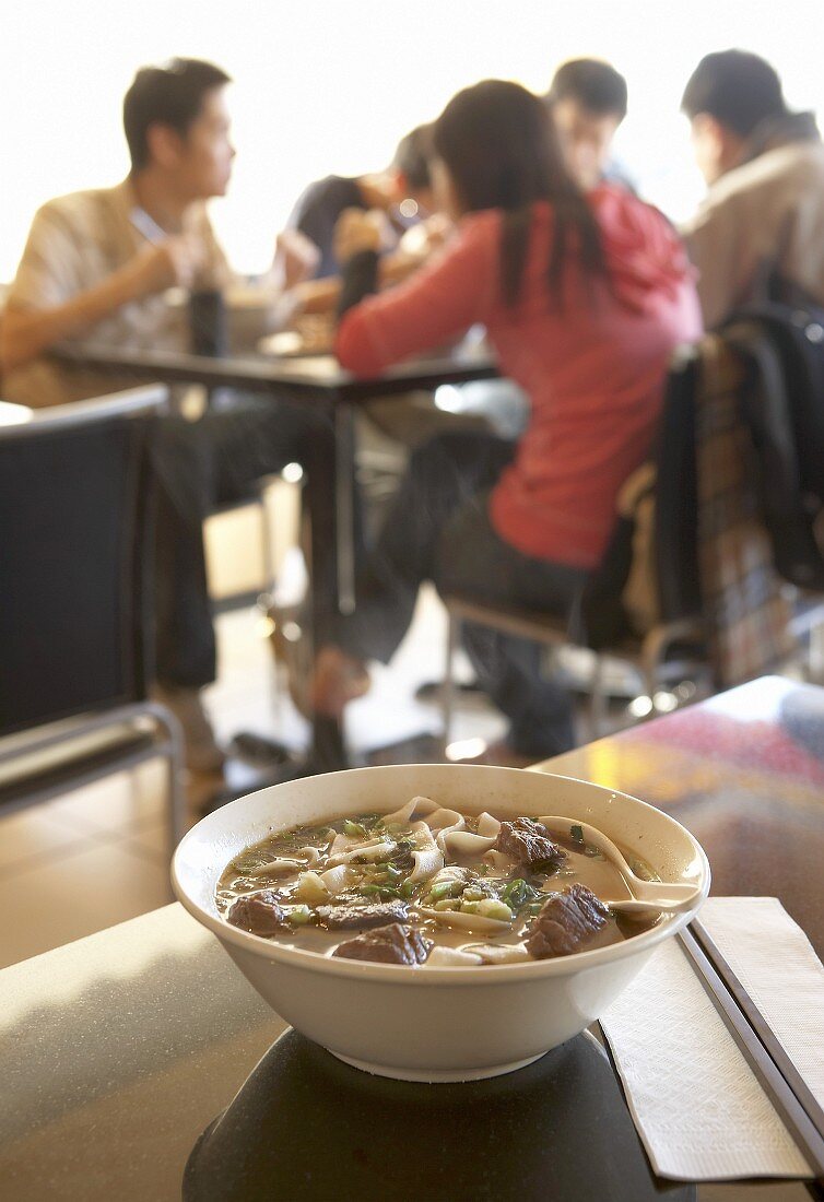 Beef noodle soup in a restaurant (Asia)
