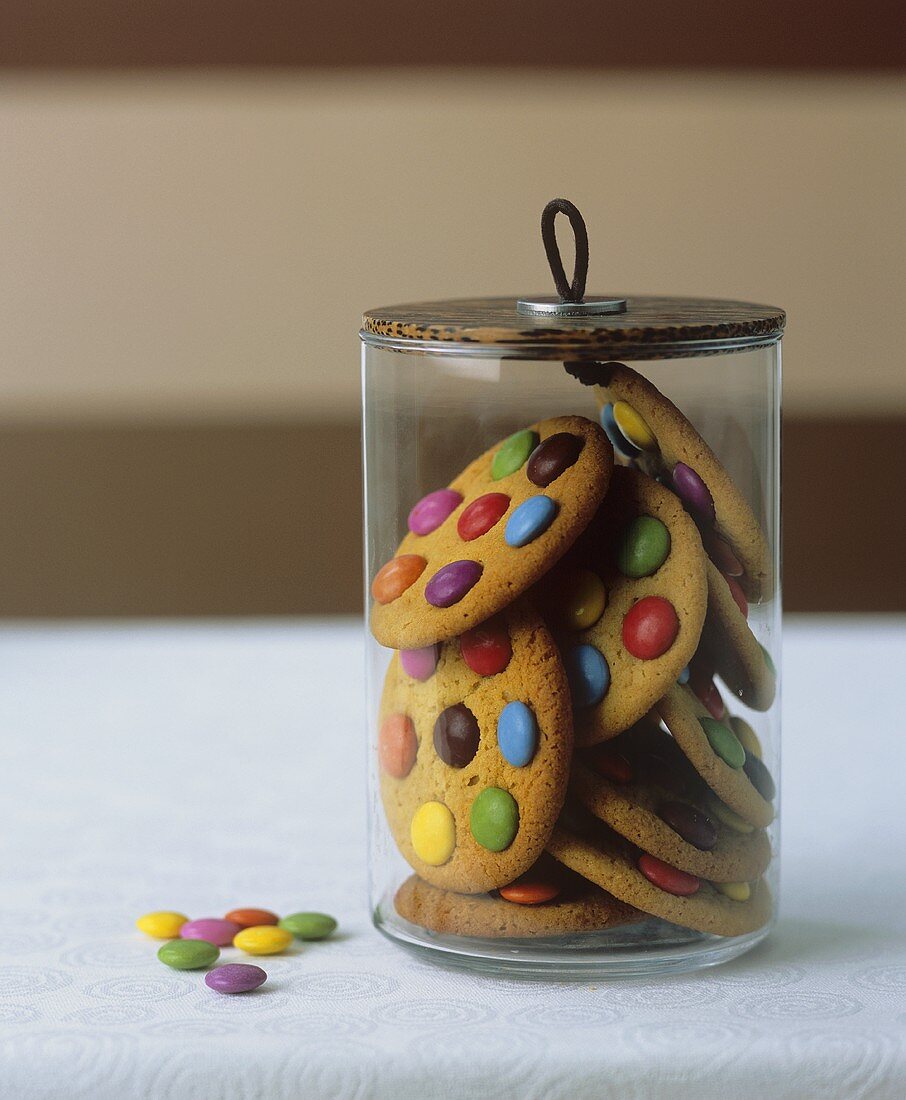 Cookies with chocolate beans in a cookie jar