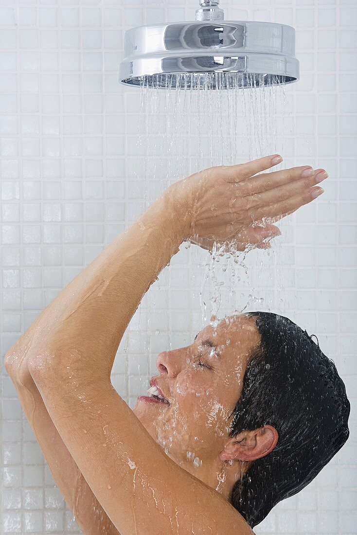 A woman taking a shower