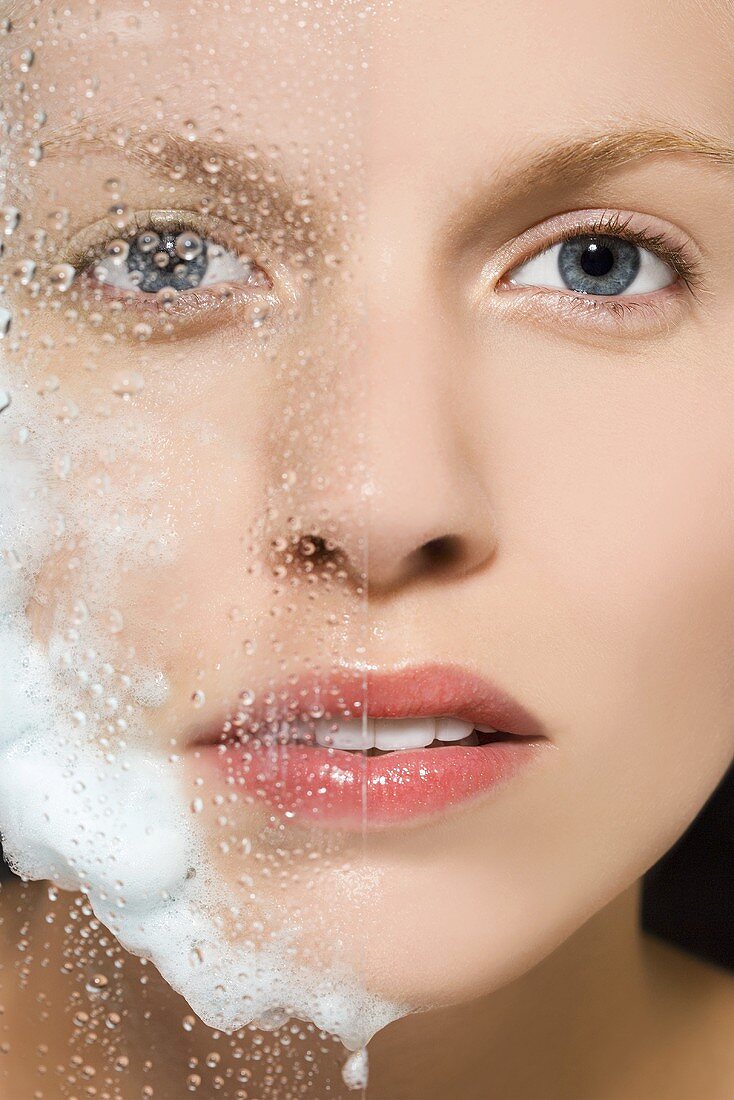 A woman with soap on her face