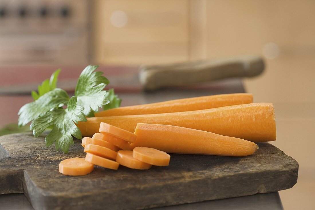 Peeled carrots on a cutting board