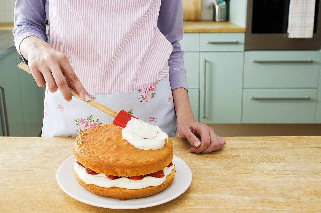 Woman making a cake