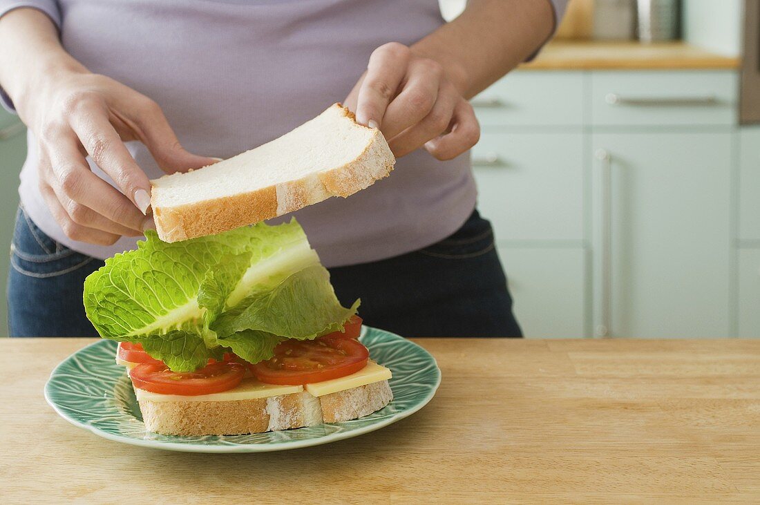 Woman making sandwich